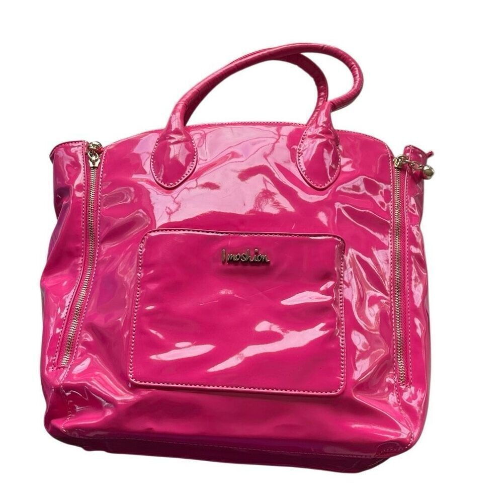 Imoshion pink patent leather bag with beautiful lining inside.